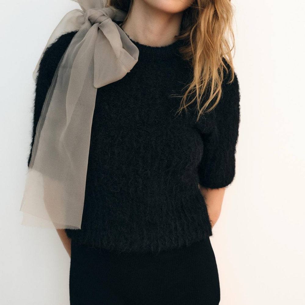 Chic Black Textured Sweater with Bow Accent